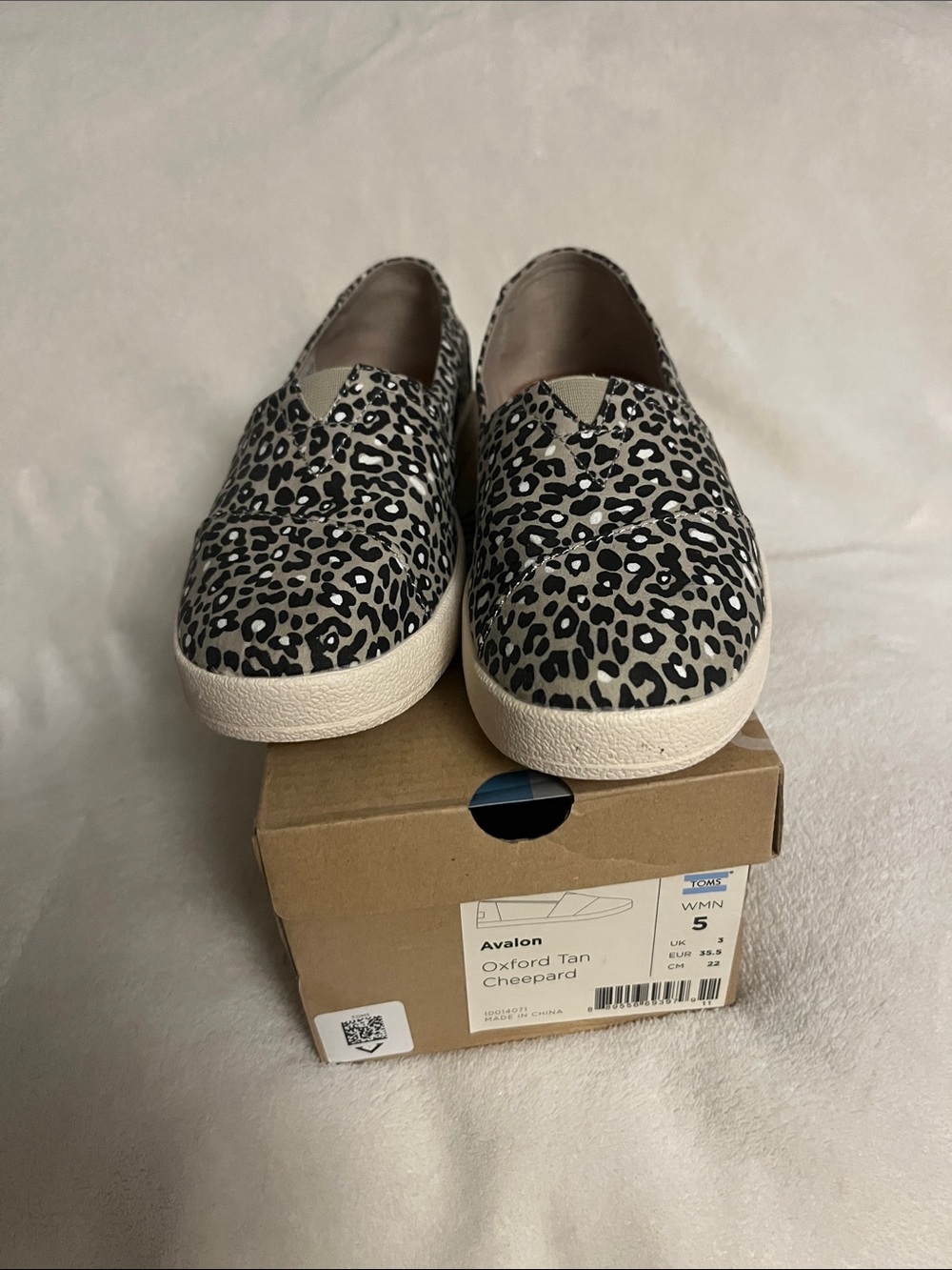 Toms Leopard Print Slip-On Flats in Black and Tan